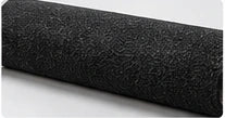 Textured black foam grip close-up